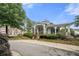 Beautiful community clubhouse with inviting entrance, professional landscaping and manicured lawn at 3655 Chattahoochee Summit Se Dr # 16, Atlanta, GA 30339