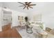 Bright living room with hardwood floors, ceiling fan, and neutral decor at 3655 Chattahoochee Summit Se Dr # 16, Atlanta, GA 30339