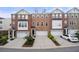 Brick townhomes with attached garages, manicured landscaping and ample parking spaces at 3655 Chattahoochee Summit Se Dr # 16, Atlanta, GA 30339