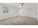 Bedroom featuring neutral carpet, natural light, and a ceiling fan at 3690 Basswood Rd, Snellville, GA 30039