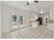 Kitchen with white cabinets, stainless steel appliances, granite countertops, and a double french door at 3690 Basswood Rd, Snellville, GA 30039