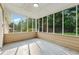 Screened patio offering a great view of the backyard and surrounding greenery at 3690 Basswood Rd, Snellville, GA 30039