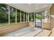 Screened patio with a door to backyard at 3690 Basswood Rd, Snellville, GA 30039
