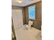 Bathroom with toilet, vanity, and closet at 5560 Old Bill Cook Rd, College Park, GA 30349