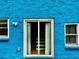 Close up of a back exterior wall, sliding glass door, and windows at 5560 Old Bill Cook Rd, College Park, GA 30349