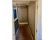Hallway with gray walls and brown carpet with access to different rooms on the upper level at 5560 Old Bill Cook Rd, College Park, GA 30349
