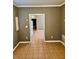 Inviting living room space with tile flooring and neutral wall paint at 5560 Old Bill Cook Rd, College Park, GA 30349