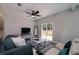 Open living room with deck access, comfortable seating, and modern entertainment setup at 944 Woodland Ave, Atlanta, GA 30316