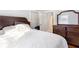 This spacious bedroom has a large closet and dressing mirror with built in storage at 1087 Longley Nw Ave, Atlanta, GA 30318