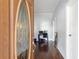 Ornate front door leads to a entry hall with hardwood floors and natural light at 1087 Longley Nw Ave, Atlanta, GA 30318