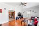 Comfortable living room features gleaming hardwood floors and access to the kitchen at 1091 Longley Nw Ave, Atlanta, GA 30318