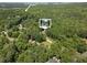 Aerial shot of a home nestled amongst the trees near Sweetwater Creek State Park at 2158 Huckleberry Ln, Lithia Springs, GA 30122