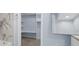 Bathroom leads into walk-in closet and offers a large mirror and new countertops at 2158 Huckleberry Ln, Lithia Springs, GA 30122