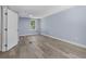 Bedroom features new laminate flooring and a window providing lots of natural light at 2158 Huckleberry Ln, Lithia Springs, GA 30122