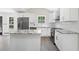 Bright kitchen featuring stainless steel appliances, granite countertops, and white cabinetry at 2158 Huckleberry Ln, Lithia Springs, GA 30122