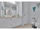 Bright bathroom with a large vanity, and a linen closet at 305 River Glen Dr, Roswell, GA 30075