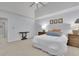 Spacious bedroom with a vaulted ceiling, soft carpet, and two large nightstands at 305 River Glen Dr, Roswell, GA 30075