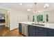 Spacious kitchen featuring an island, stainless steel dishwasher and a view into the breakfast nook at 3453 Drayton Ne Dr, Roswell, GA 30075