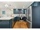 Modern kitchen with stainless steel appliances, and island with quartz countertops at 3453 Drayton Ne Dr, Roswell, GA 30075