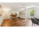 Inviting office area featuring hardwood floors, natural light, and a comfortable workspace at 3453 Drayton Ne Dr, Roswell, GA 30075