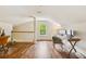 Bright office space with hardwood floors, natural light, and a modern desk setup at 3453 Drayton Ne Dr, Roswell, GA 30075