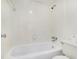 Clean, white bathroom with tub and shower at 123 Maison Nw Pl, Atlanta, GA 30327