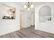 Open dining area with passthrough to kitchen, seamlessly blending cooking and dining, ideal for both casual and formal gatherings at 123 Maison Nw Pl, Atlanta, GA 30327
