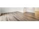 The living room features new hard surface flooring, offering durability and contemporary aesthetic appeal for entertaining at 123 Maison Nw Pl, Atlanta, GA 30327