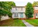 Charming exterior elevation of home with a tree lined yard and welcoming curb appeal at 1406 Springleaf Se Cir, Smyrna, GA 30080