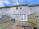 Backyard featuring a patio with fenced yard and exterior of siding home at 1892 Old Dogwood, Jonesboro, GA 30238