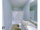 Bathroom with a tub-shower combo, granite countertops, and a modern vanity at 1892 Old Dogwood, Jonesboro, GA 30238