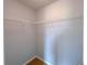 Walk-in closet with wire shelving for efficient storage at 1892 Old Dogwood, Jonesboro, GA 30238