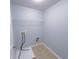 Laundry room with connections for a washer and dryer and shelving at 1892 Old Dogwood, Jonesboro, GA 30238