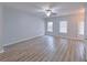 Bright living room featuring neutral paint, ceiling fan, and access to the backyard at 1892 Old Dogwood, Jonesboro, GA 30238