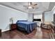 Bedroom with hardwood floors, ceiling fan and plenty of light at 4180 Gables Pl, Buford, GA 30519