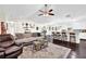 Open-concept design seamlessly connects the living room with the kitchen island at 4180 Gables Pl, Buford, GA 30519
