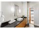 Stylish bathroom with a modern vanity, vessel sink, and sleek lighting fixtures at 878 Peachtree Ne St # 704, Atlanta, GA 30309