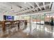 Bright common area with large windows, high ceilings, and a long counter for seating at 878 Peachtree Ne St # 704, Atlanta, GA 30309