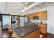 Well-appointed kitchen featuring granite countertops, stainless steel appliances, and a large island with barstool seating at 878 Peachtree Ne St # 704, Atlanta, GA 30309