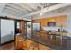 Island kitchen with bar seating and stainless steel appliances at 878 Peachtree Ne St # 704, Atlanta, GA 30309