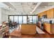 Open-concept living space featuring a modern kitchen, dining area, and cozy living room at 878 Peachtree Ne St # 704, Atlanta, GA 30309