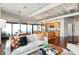 Spacious living area with an open layout connecting to a modern kitchen and dining space at 878 Peachtree Ne St # 704, Atlanta, GA 30309