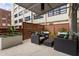 Outdoor patio with comfortable seating areas and planter boxes at 878 Peachtree Ne St # 704, Atlanta, GA 30309