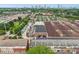 Aerial view showcasing townhomes near a variety of shopping and services with skyline in the distance at 190 Marion Ne Pl, Atlanta, GA 30307