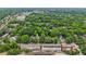 Aerial view showcasing townhomes in a neighborhood with lush greenery and mature trees for privacy and shade at 190 Marion Ne Pl, Atlanta, GA 30307