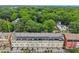 Aerial view of upscale townhomes with private balconies, surrounded by lush greenery in a well-treed neighborhood at 190 Marion Ne Pl, Atlanta, GA 30307