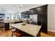 Modern kitchen with dark cabinets, granite island, and stainless steel appliances at 190 Marion Ne Pl, Atlanta, GA 30307