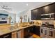 Modern kitchen features stainless steel appliances, granite countertops, and dark cabinets at 190 Marion Ne Pl, Atlanta, GA 30307