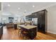 Spacious kitchen featuring dark cabinetry, granite island, and stainless steel appliances at 190 Marion Ne Pl, Atlanta, GA 30307