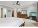 Spacious main bedroom includes a ceiling fan and wooden furniture at 190 Marion Ne Pl, Atlanta, GA 30307